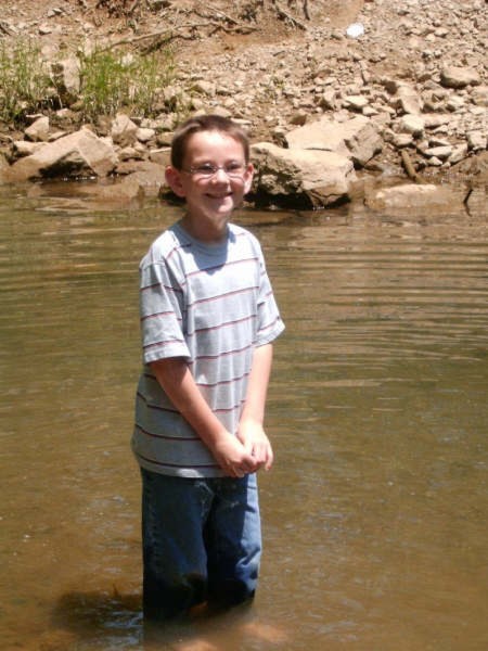 Brad in creek.JPG